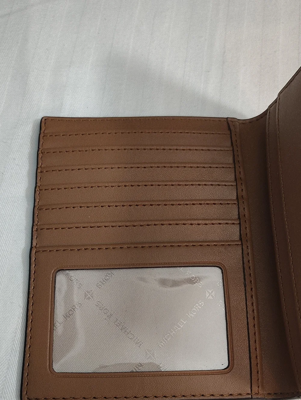 Michael Kors Brown Signature Logo Passport/Card Holder with Gold Logo